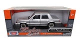 Auto Escala Plymouth Reliant 1983 - Color Silver - 1:24 - Motormax - 73336