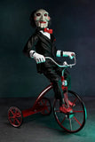 Figura Saw-titere con triciclo 12" Neca NC-60607